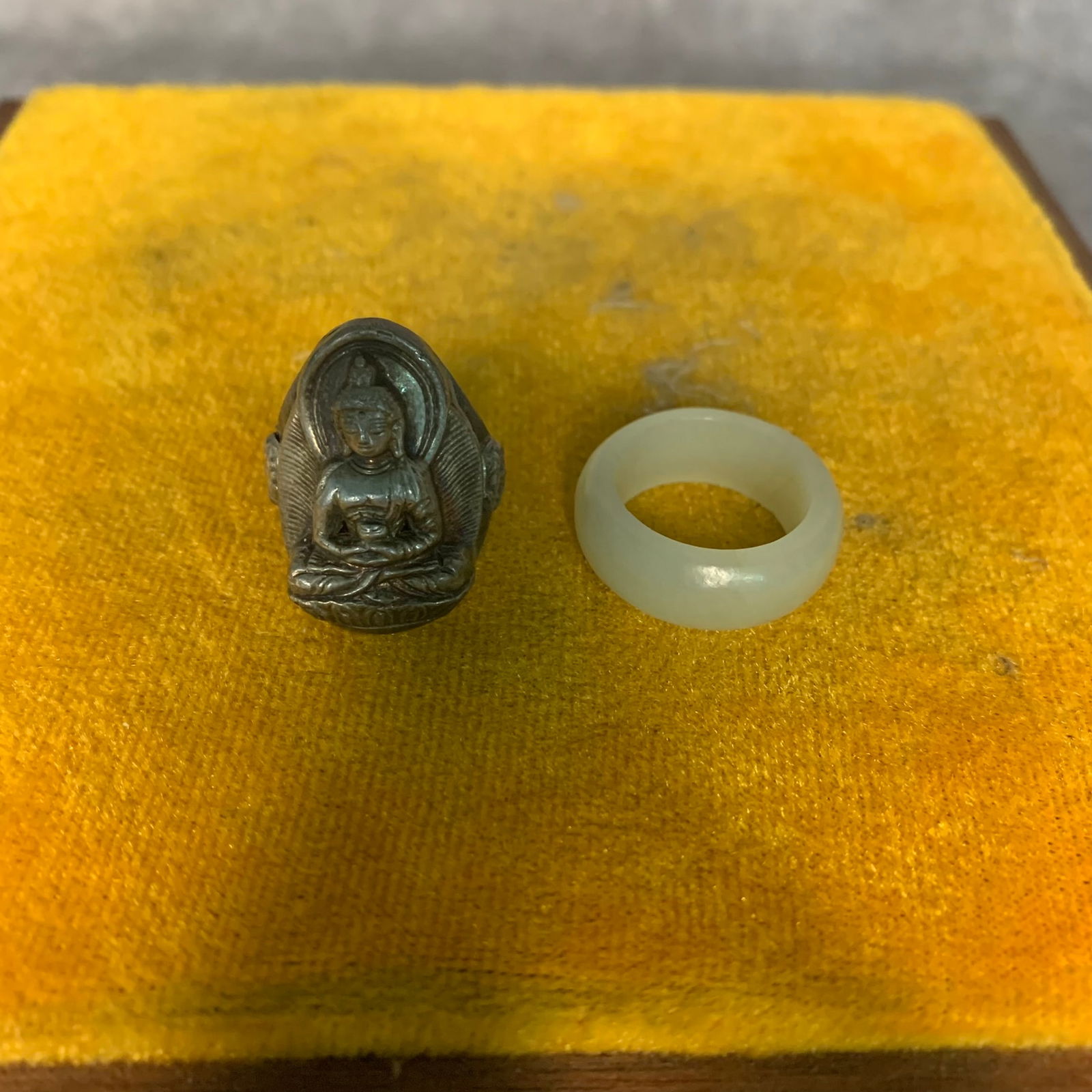 A FINE SILVER MADE BUDDHA RING AND JADE MADE RING: Modern; Long: 1.1 inch; Width: 0.8 inch; Inner Diameter: 0.7 inch; Outter Diameter: 1 inch;