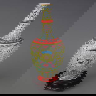 FAMILLE ROSE YELLOW GROUND FLOWER PATTERN PORCELAIN VASE: Qing Dynasty Qian Long Period; Diameter: 3.1 inch; High: 11.0 inch