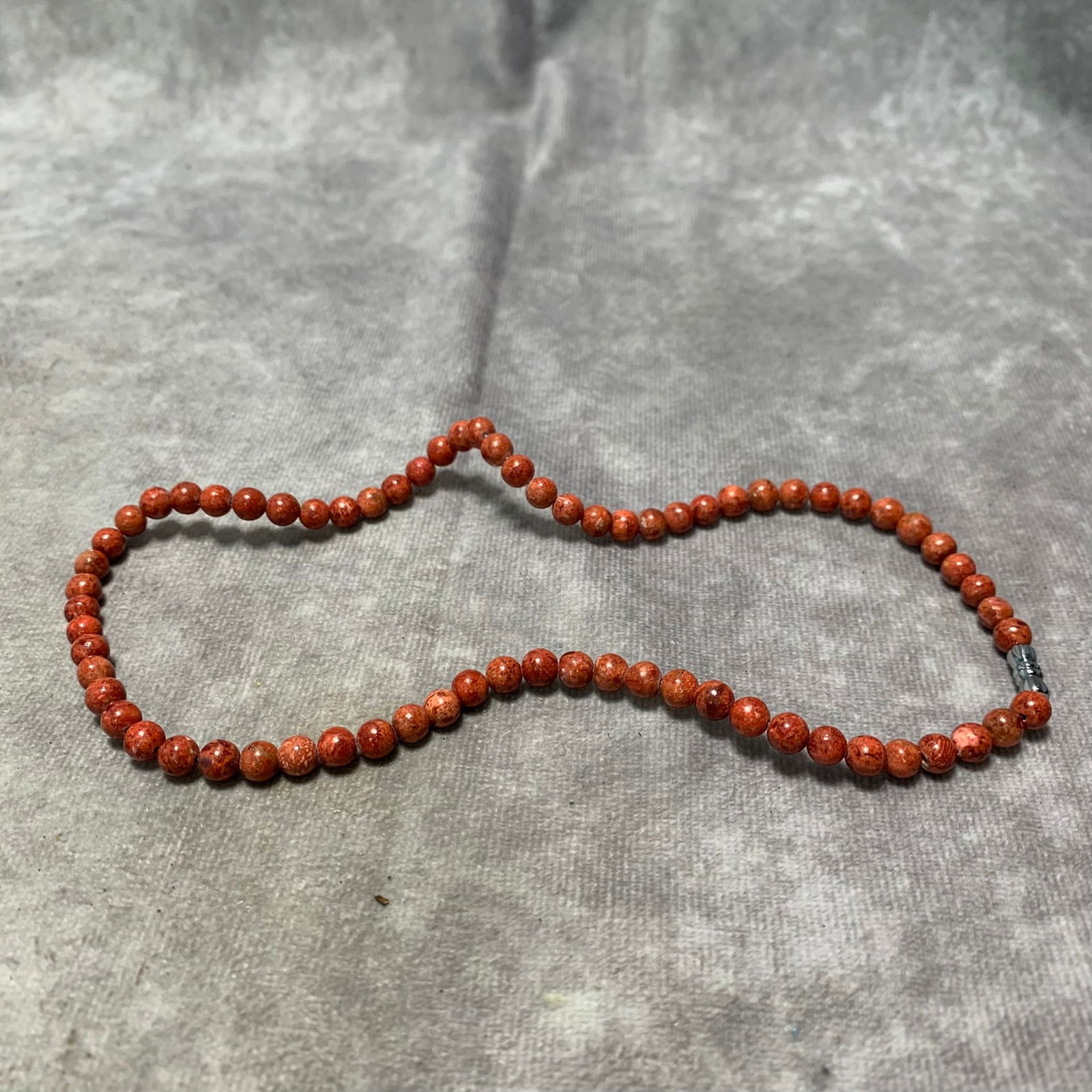 A FINE CORAL NECKLACE (SINGLE BEAD DIAMETER: 0.23 CM): Republic Period; Long: 15 inch