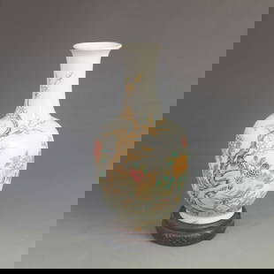 A FINE ENAMEL COLOR FLOWER AND BIRD PATTERN PORCELAIN VASE: Qing Dynasty Qianlong Period; High: 9.30 inch; Diameter: 5.00 inch;