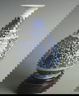 BLUE AND WHITE LOTUS PATTERN YUHUCHUN STYLE PORCELAIN VASE: Qing Dynasty Qian Long Period; High: 9.00 inch; Width: 5.30 inch