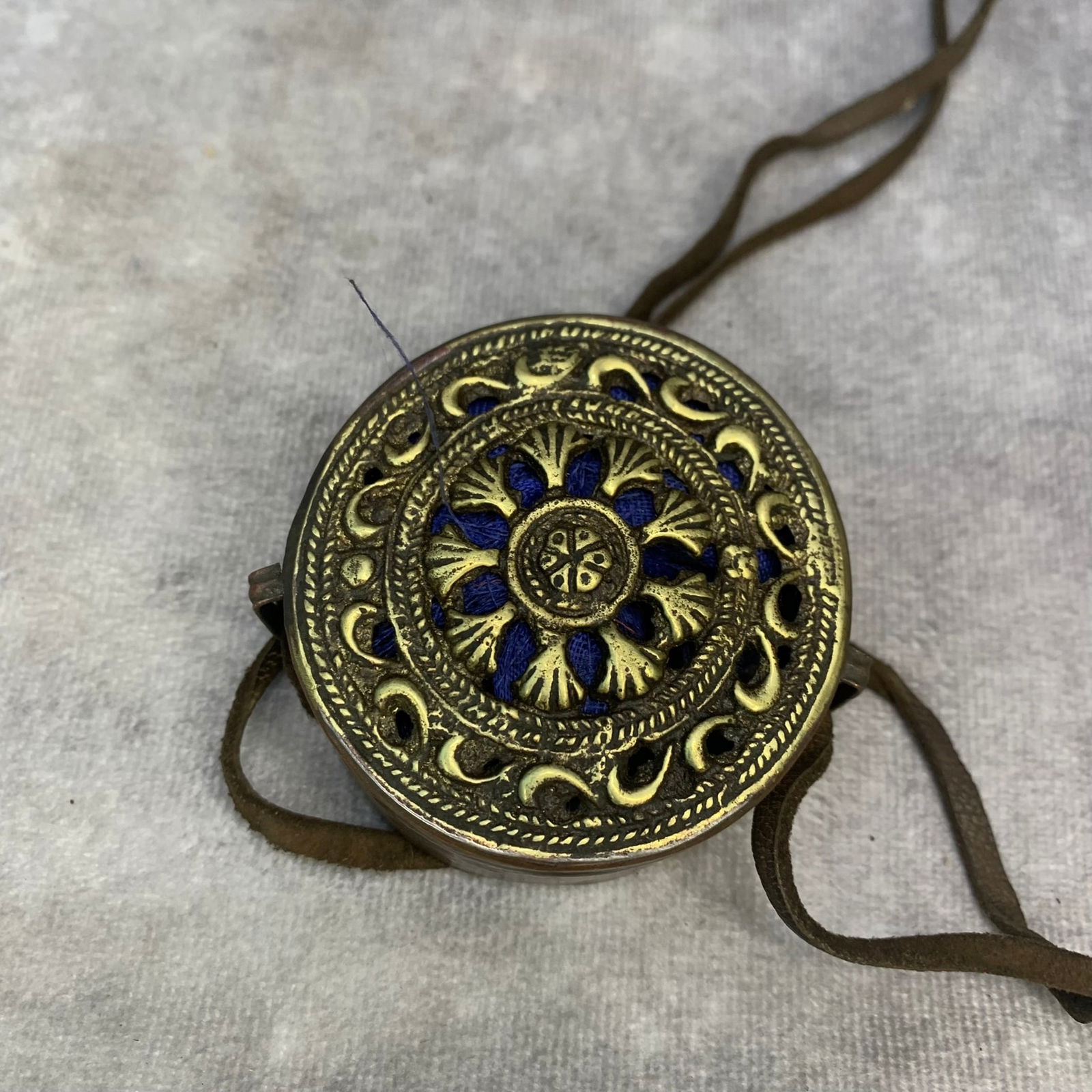 A FINE TIBETAN BUDDHIST GAWU PENDANT (1 of 3)