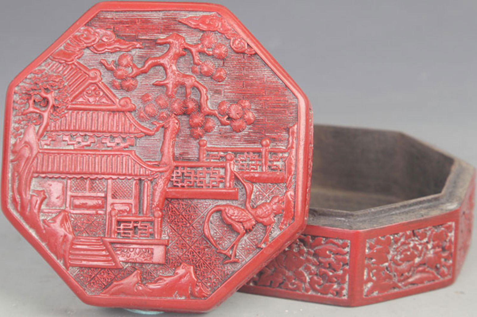 CARVED RED LACQUER PINE AND CRANE PATTERN OCTAGONAL BOX (1 of 4)