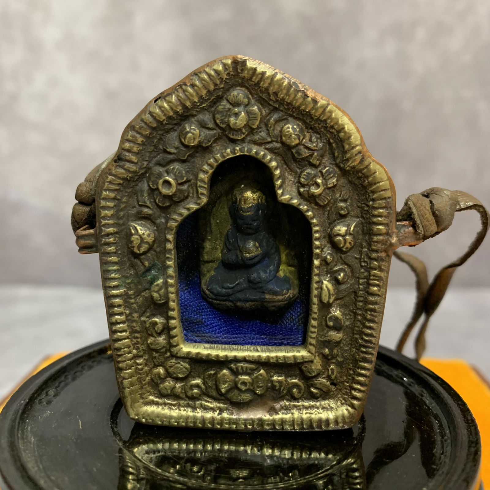A FINE TIBETAN BUDDHIST GAWU PENDANT (1 of 3)