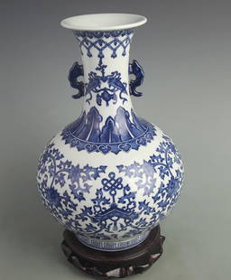 BLUE AND WHITE LOTUS PATTERN DOUBLE-EARED PORCELAIN VASE: Qing Dynasty Qian Long Period; High: 13.5 inch; Width: 8.00 inch;