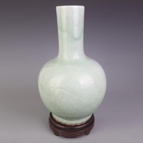 CELADON GLAZED CARVED GLOBE STYLE PORCELAIN VASE