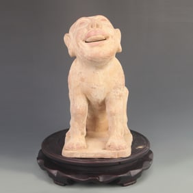 A HANG DYNASTY STYLE HUMAN-FACED GRAVE-GUARDING BEAST