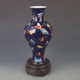FAMILLE ROSE GUANYIN VASE WITH HUNDRED BUTTERFLIES