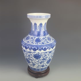 BLUE AND WHITE PORCELAIN VASE WITH INTERTWINED LOTUS DESIGN