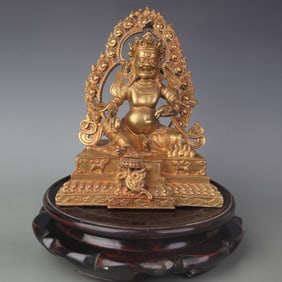 A FINE BRONZE DZAMBHALA BUDDHA STATUE