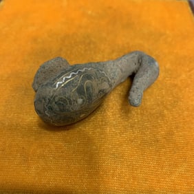 A FINE OLD BRONZE BELT HOOK