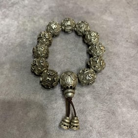 A FINELY CARVED WHITE BRONZE BRACELETS