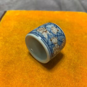 QING BLUE AND RED GLAZED PRUNUS-PATTERN FINGER RING