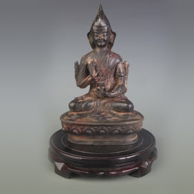 A FINE BRONZE TSONGKHAPA STATUE