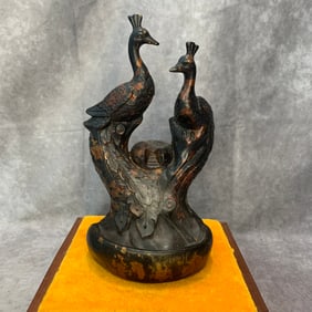A FINE BRONZE STATUE OF TWO PHOENIX