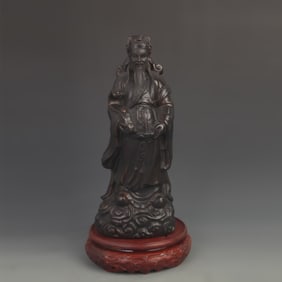 A FINELY CARVED BAMBOO FIGURE OF GOD OF WEALTH