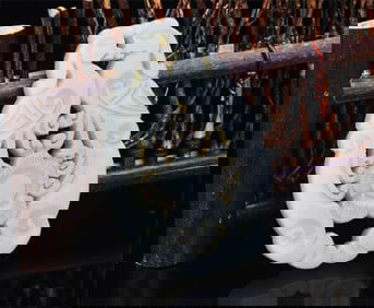 A FINE HE TIAN PALE CELADON JADE PENDANT IN FIGURE OF PHOENIX