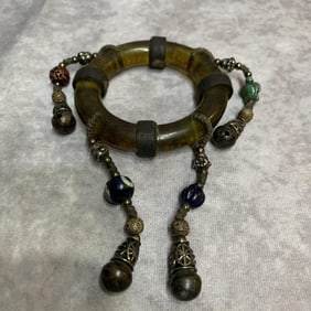 A FINE AGATE MADE BANGLE