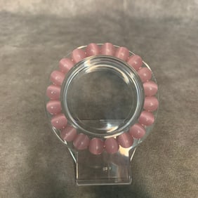 A FINE PINK COLOR CRYSTAL MADE BRACELET