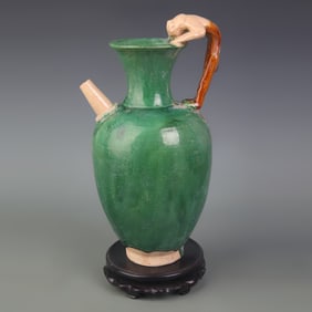 GREEN GLAZE HUMAN-FORM TEAPOT WITH HANDLE