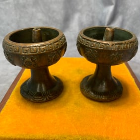 LATE QING PAIR OF EIGHT TREASURES PATTERN BRONZE CANDLESTICKS