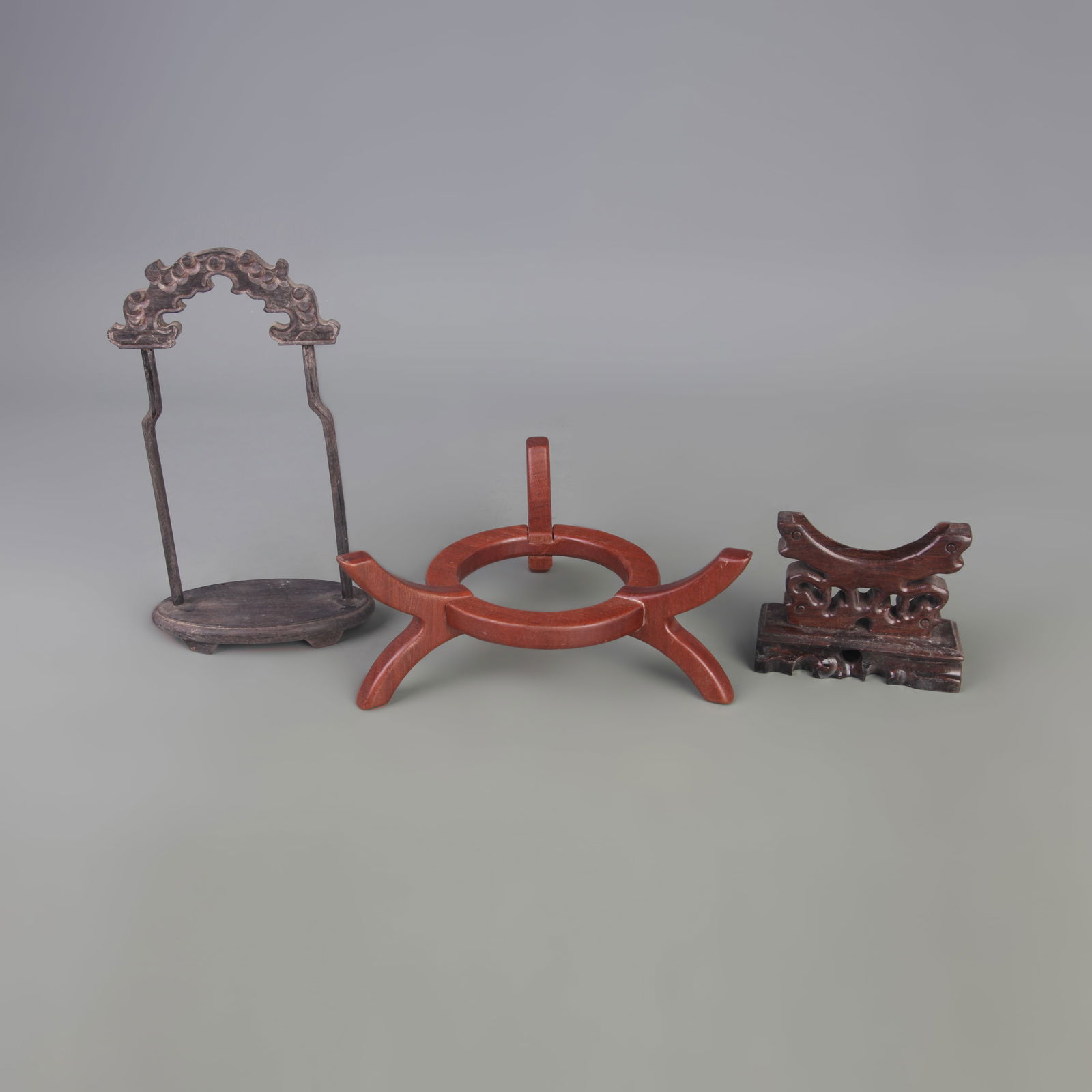 SET OF THREE WOODEN STANDS (1 of 4)
