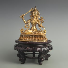 A FINE GILT BRONZE MANJUSRI BUDDHA STATUE