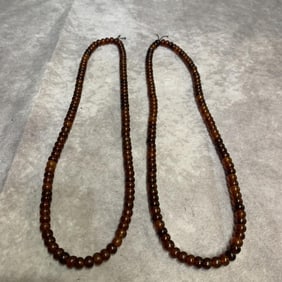 PAIR OF OLD GARNET BEAD NECKLACES