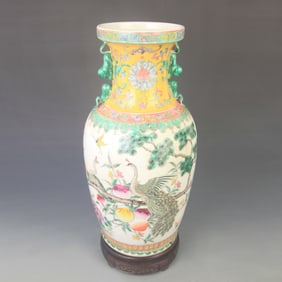 A FINE FAMILLE ROSE FLOWER PATTERN ANIMAL EAR VASE
