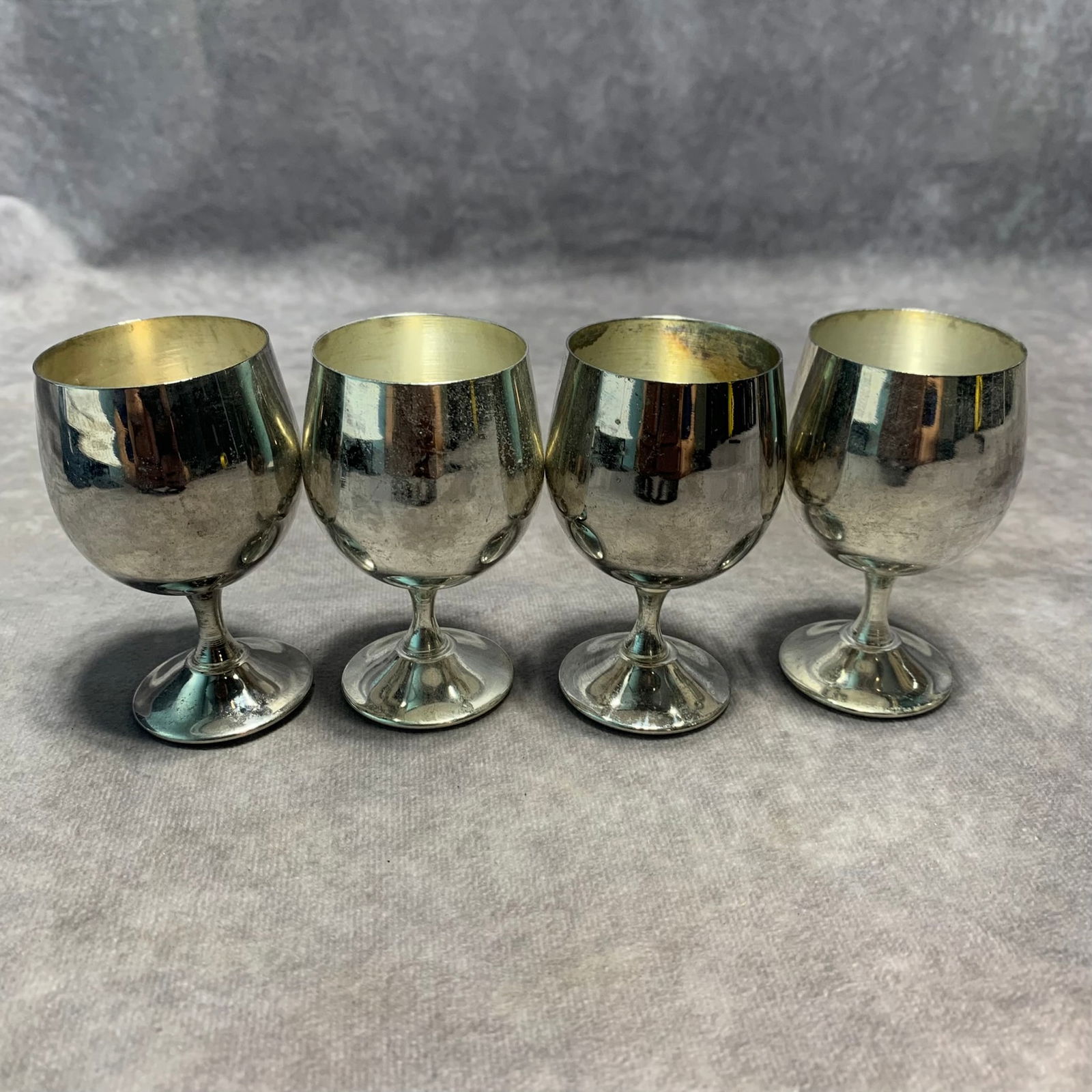 SILVER PLATED WINE GLASSES (4 PIECES): Republic Period; Long: 1.9 inch; Width: 1.9 inch; High; 3.1 inch;