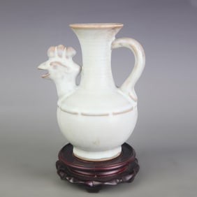CELADON GLAZED CHICKEN-HEAD FIGURE PORCELAIN EWER