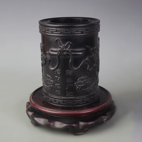 A FINE SANDALWOOD BRUSH POT CARVED WITH QI LIN MOTIF