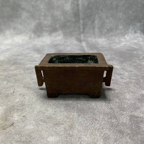 BRONZE FOUR-SIDED INCENSE BURNER WITH HANDLES