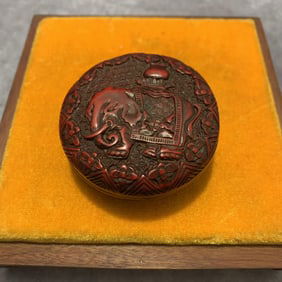 A FINE SMALL RED CARVED LACQUER BOX