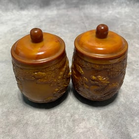 PAIR OF DRAGON AND PHOENIX PATTERNED CELLULOID JARS