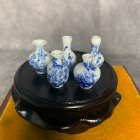 GROUP OF FIVE SMALL BLUE AND WHITE PORCELAIN BOTTLE