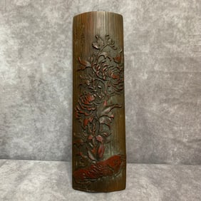 A FINELY CARVED BAMBOO MADE ARMREST