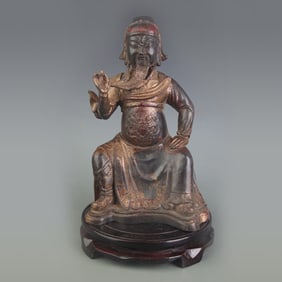 A FINE BRONZE SEATED STATUE OF GUAN GONG