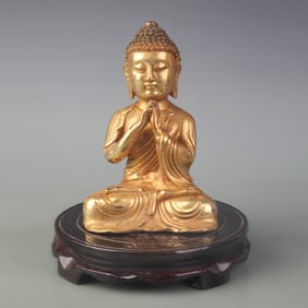 A SMALL BRONZE SHAKYAMUNI BUDDHA STATUE