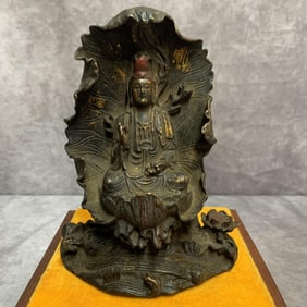 A FINELY MADE HOLLOW GUANYIN FIGURE