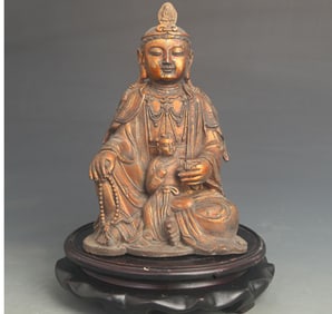 A FINE COLORED PAINTED BRONZE STATUE OF AVALOKITESHVARA