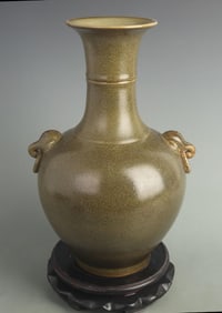 TEA-LEAF GLAZED PORCELAIN VASE WITH ELEPHANT HANDLES