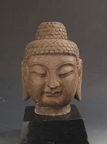 STONE-CARVED BUDDHA HEAD