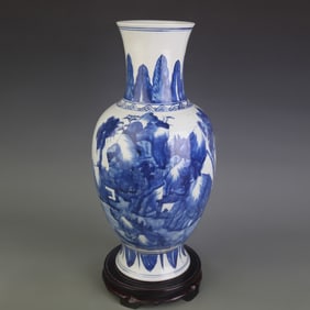 BLUE AND WHITE PORCELAIN VASE WITH LANDSCAPE DESIGN