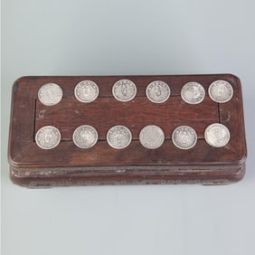 GROUP OF TWELVE SMALL CHINESE COIN