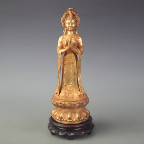 A FINE BRONZE GUANYIN STATUE