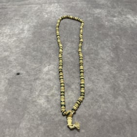 A FINE PUTI SEED NECKLACE