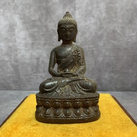 A FINE CAST IRON GAUTAMA BUDDHA STATUE