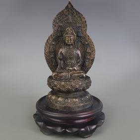 A FINE BRONZE SEATED GUANYIN STATUE