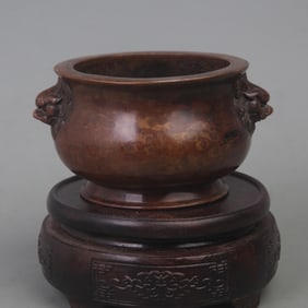 A BRONZE LION-EAR ROUND-FOOTED CENSER